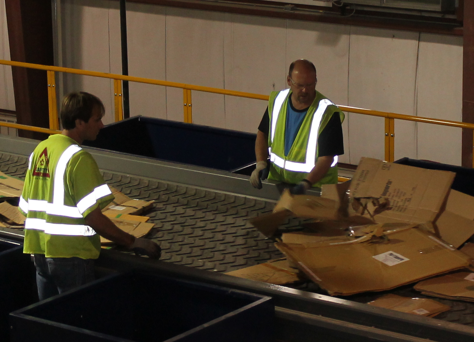 Workers sorting materials